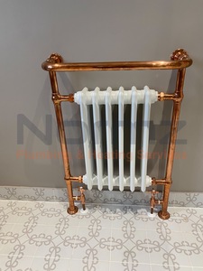 Copper towel rail radiator installed during bathroom renovation in Kettering